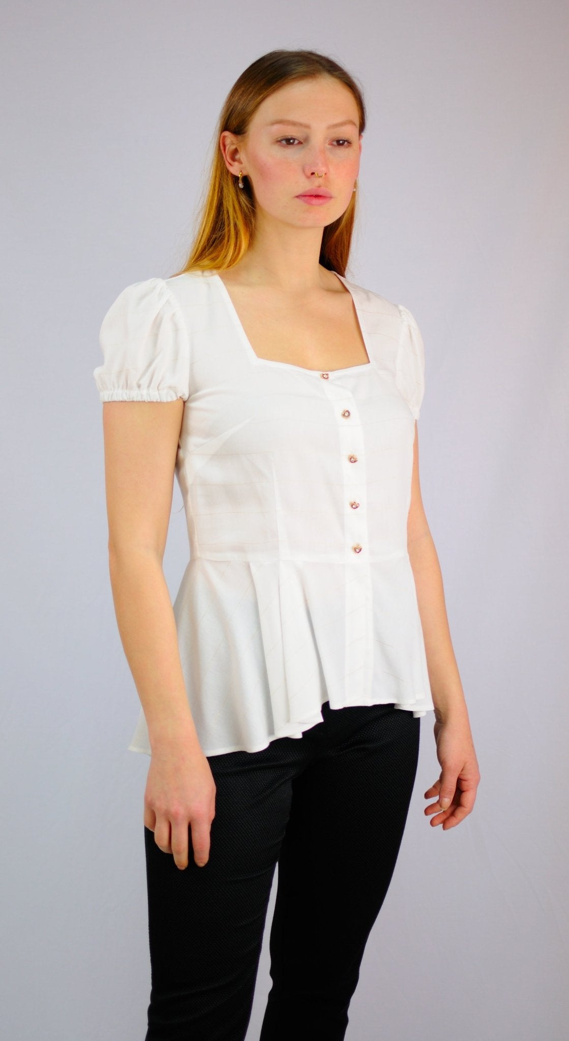 BLUSA VOLANTE